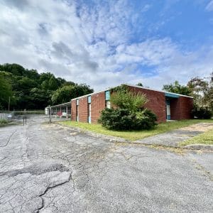 This image is by Powell Auction & Realty.