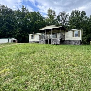 This image is by Powell Auction & Realty.