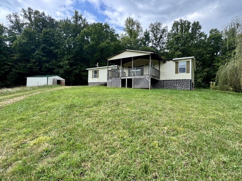 This image is by Powell Auction & Realty.