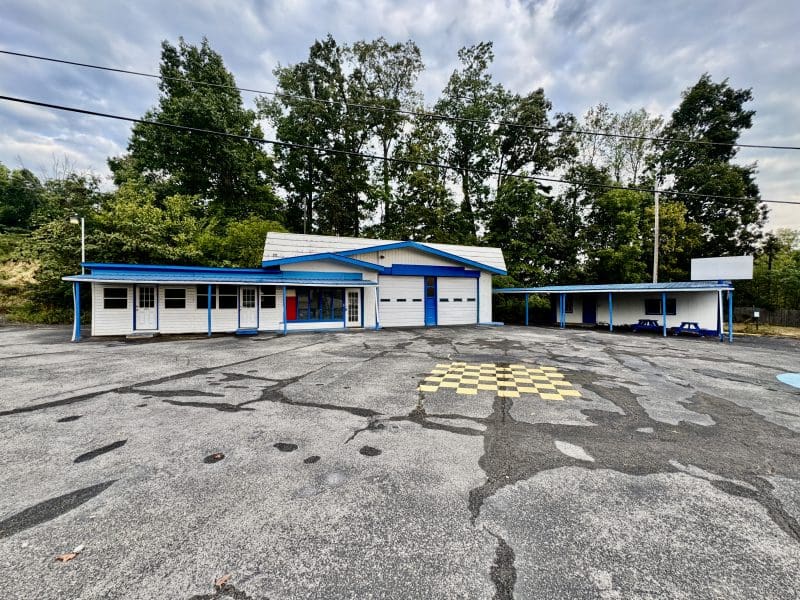 This image is by Powell Auction & Realty.