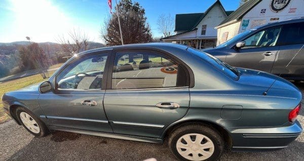 2004 driver side Powell Auction & Realty