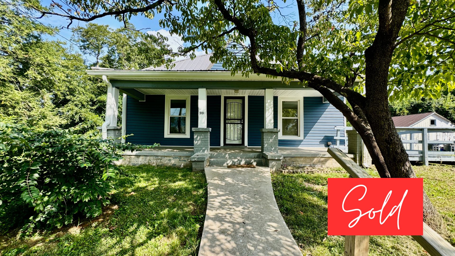This image is by Powell Auction & Realty.