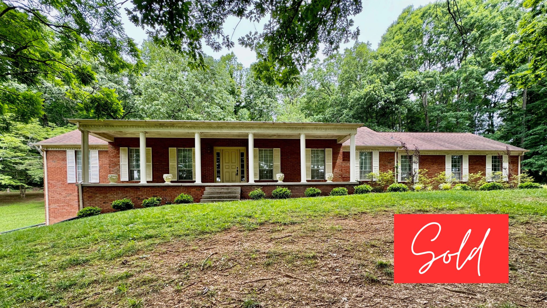 This image is by Powell Auction & Realty.