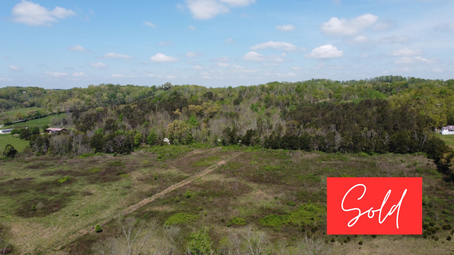 This image is by Powell Auction & Realty.