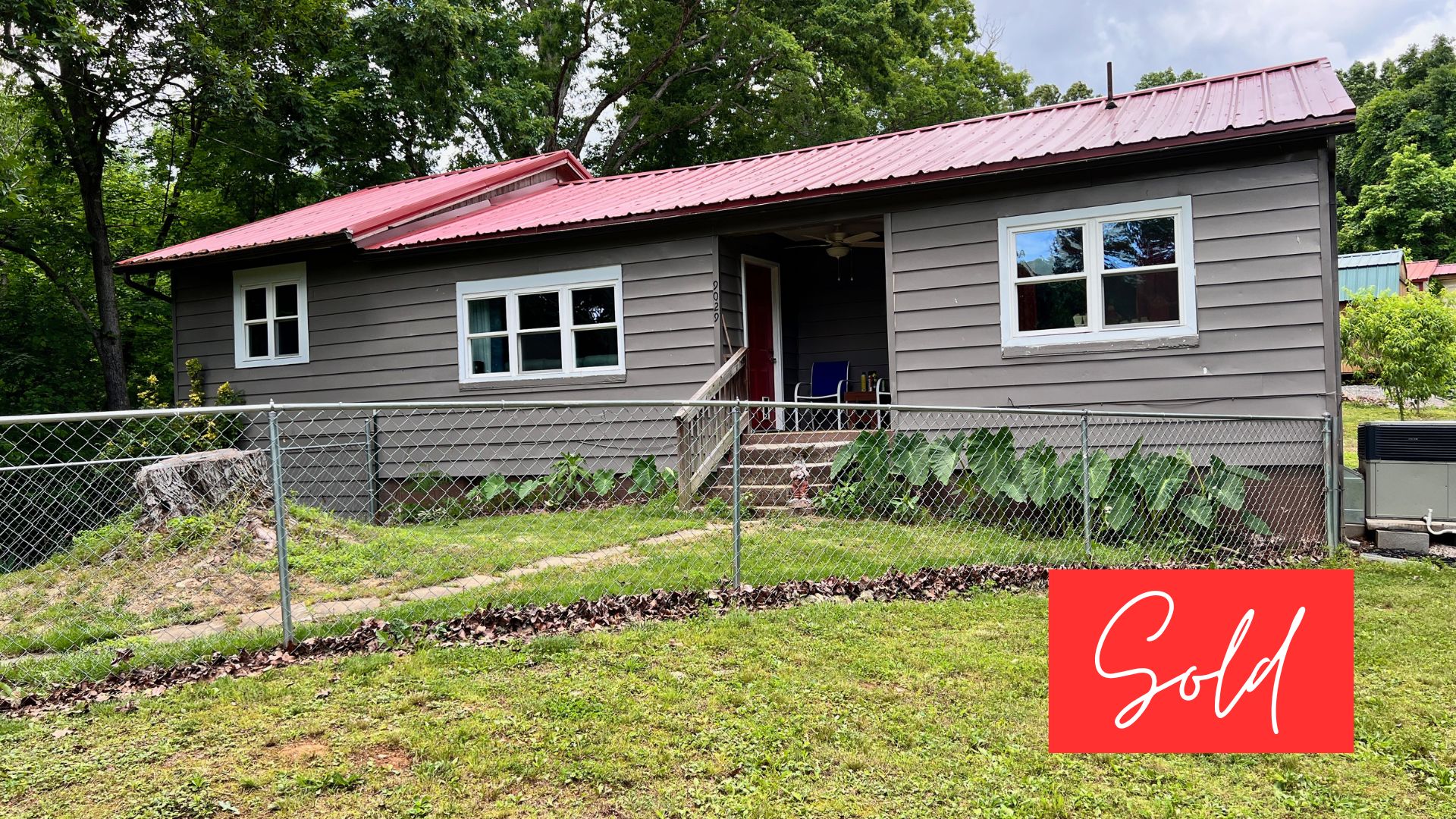 This image is by Powell Auction & Realty.