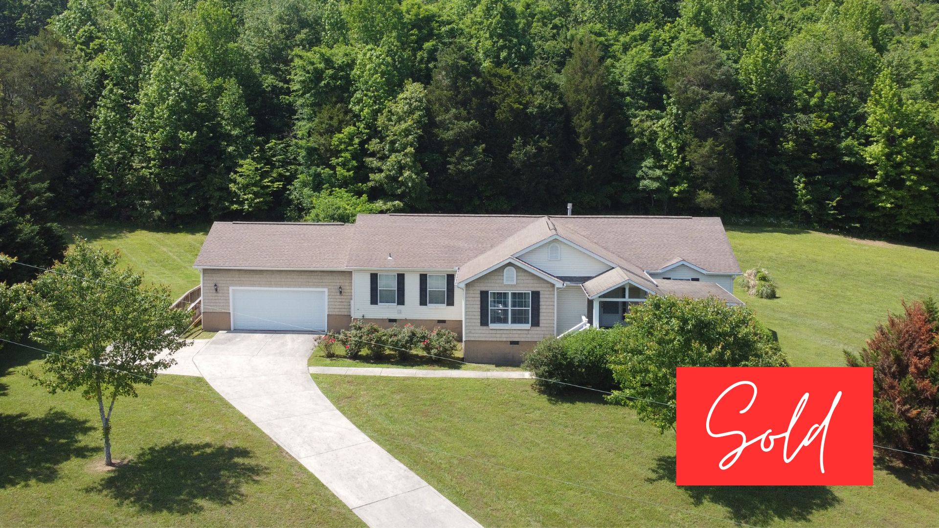 This image is by Powell Auction & Realty.