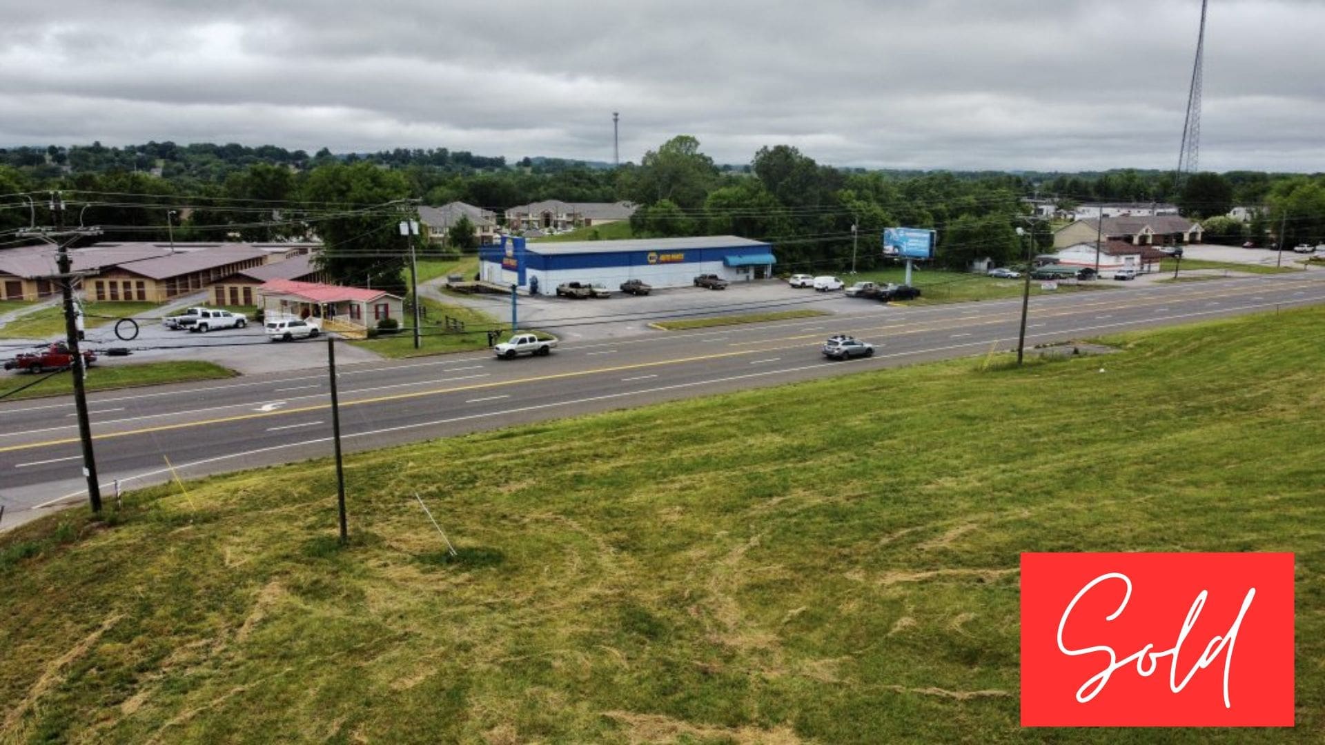 This image is by Powell Auction & Realty.