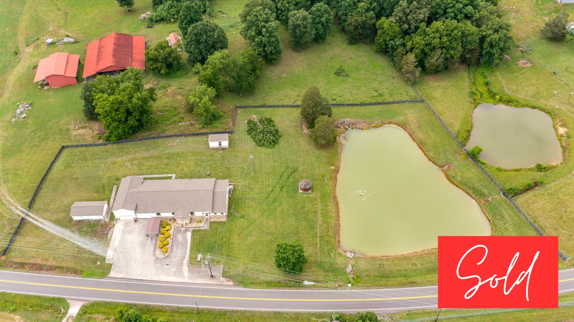 This image is by Powell Auction & Realty.