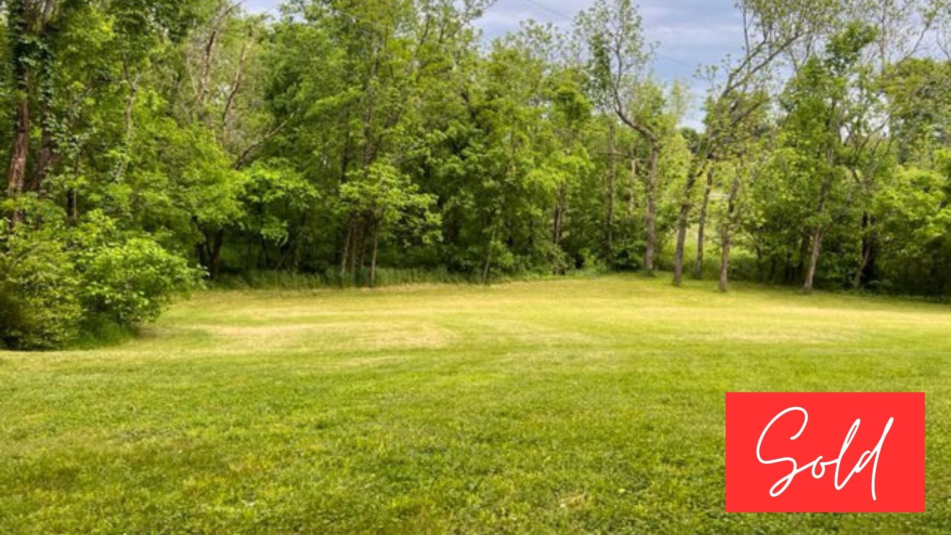 This image is by Powell Auction & Realty.