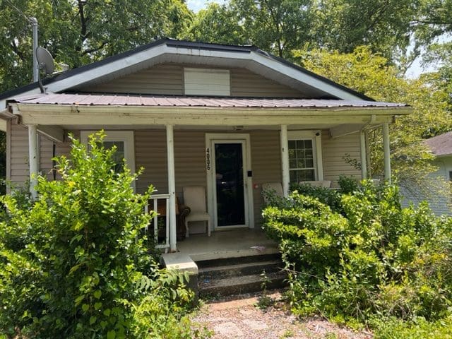 This image is by Powell Auction & Realty.