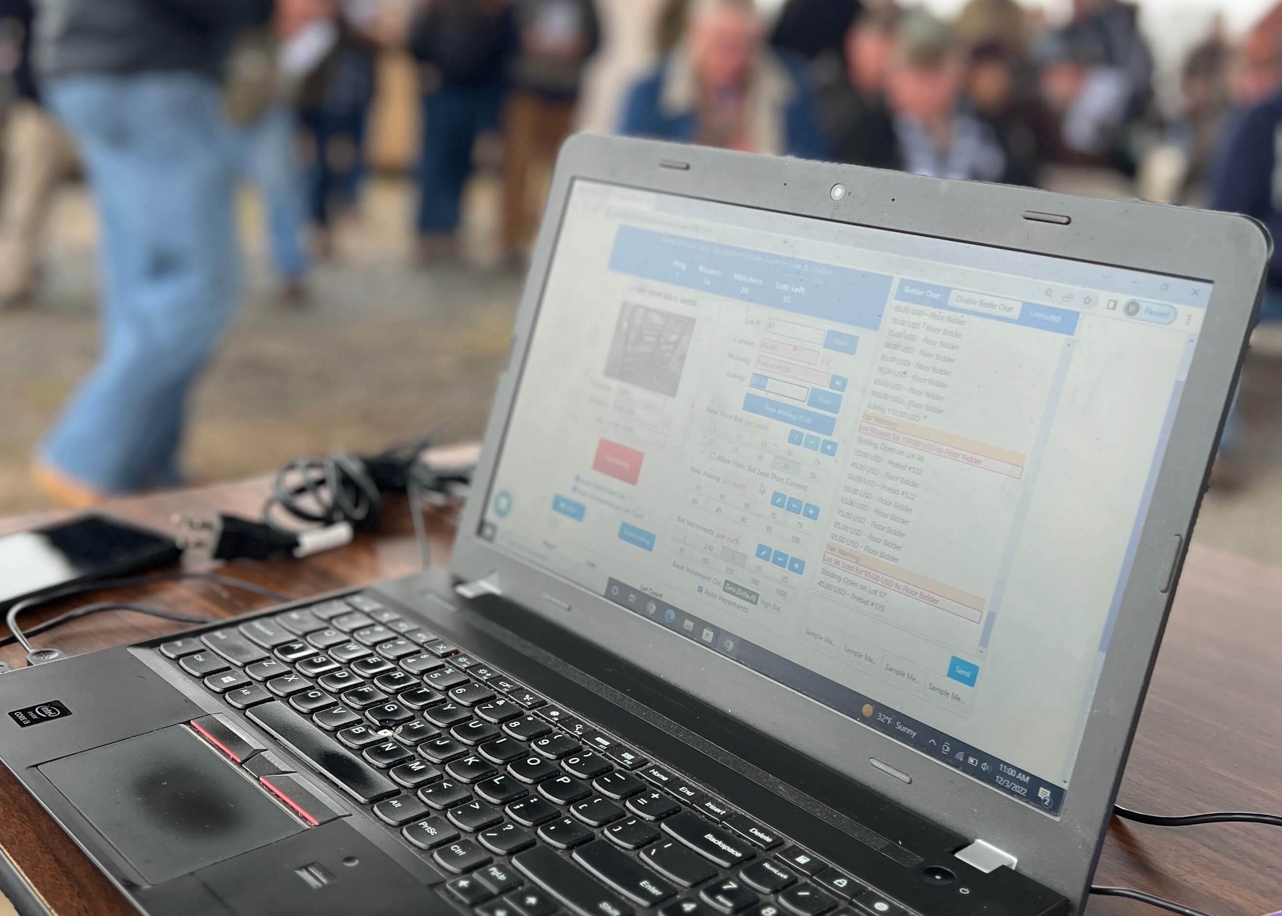 computer with online auction on screen