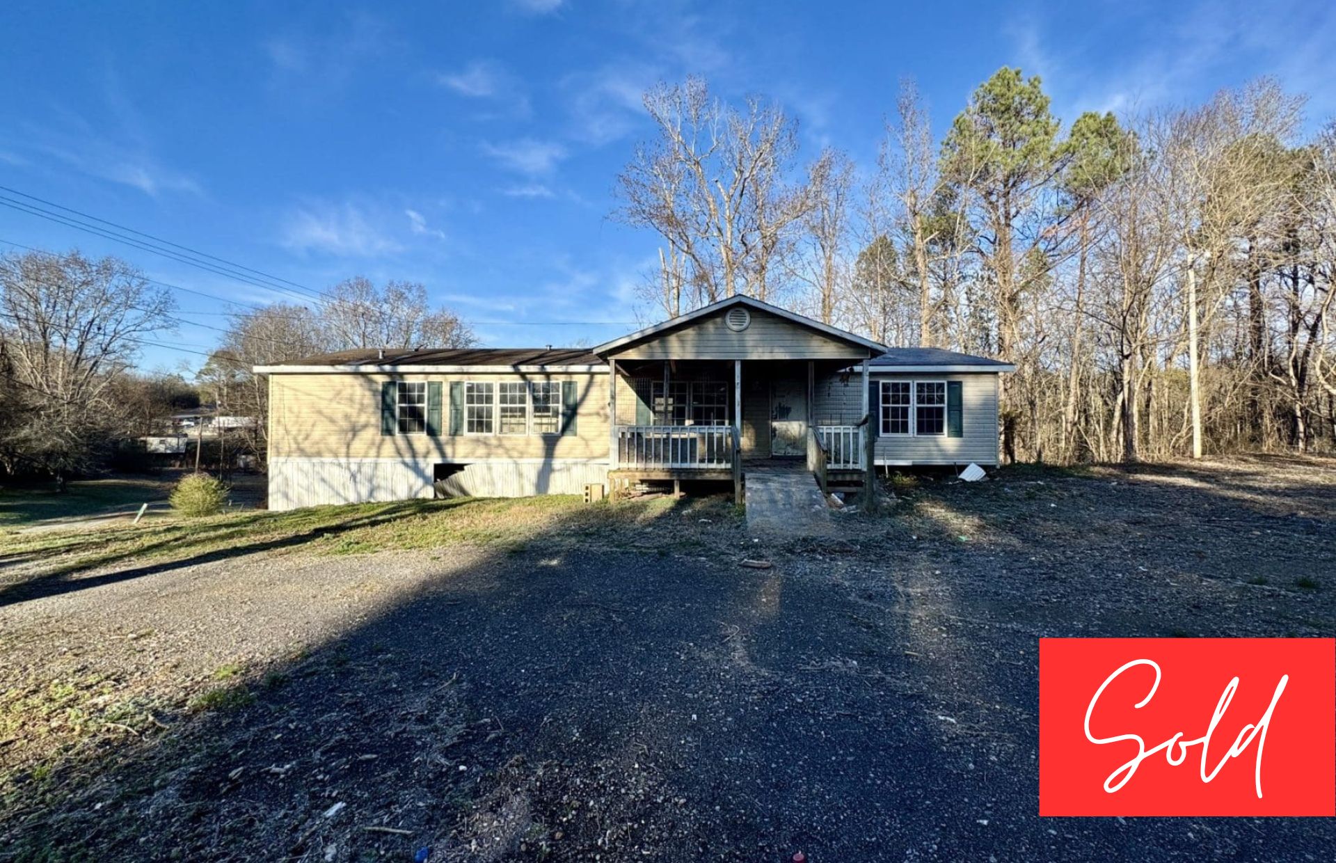 This image is by Powell Auction & Realty.