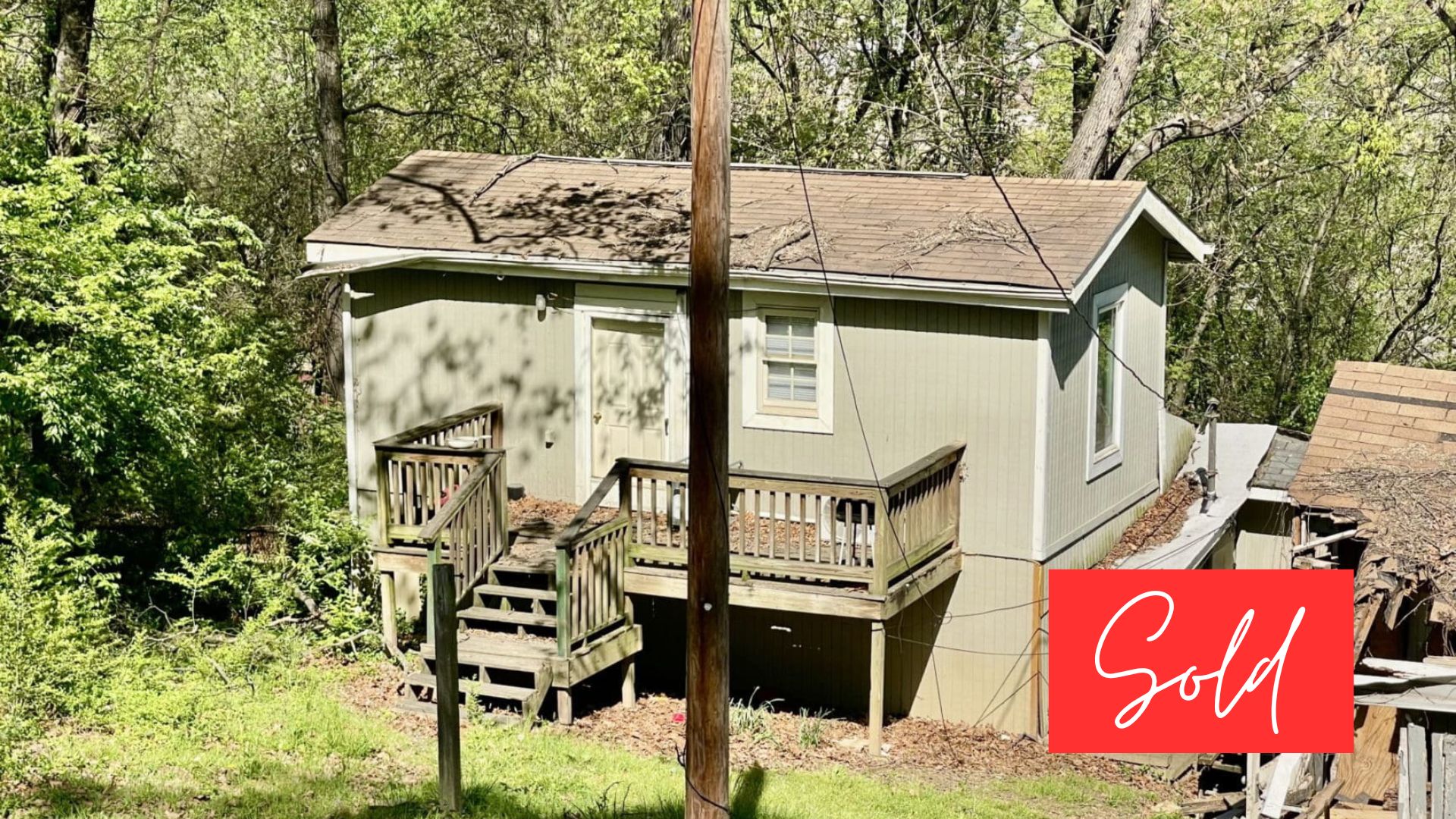 This image is by Powell Auction & Realty.