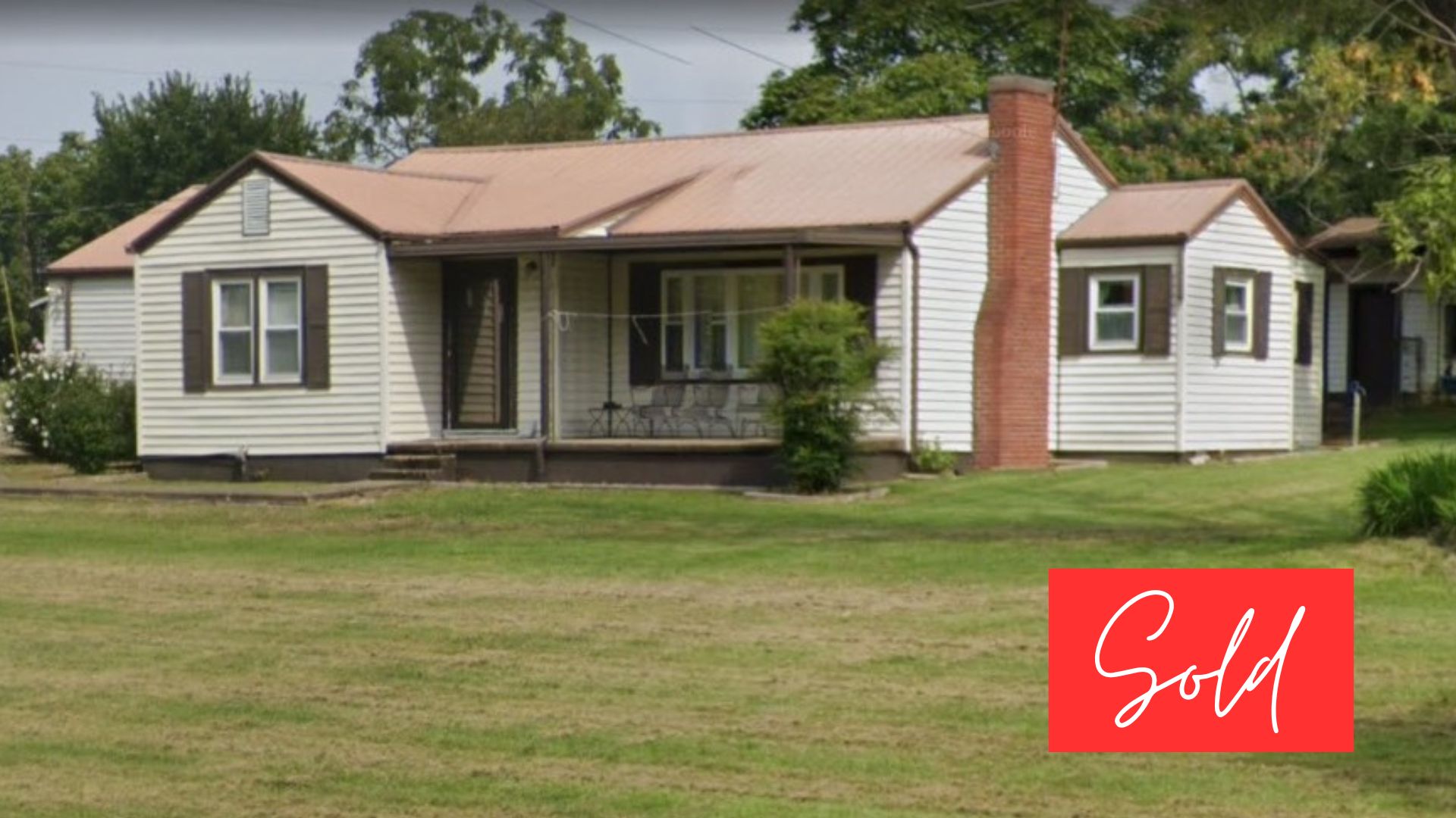 This image is by Powell Auction & Realty.