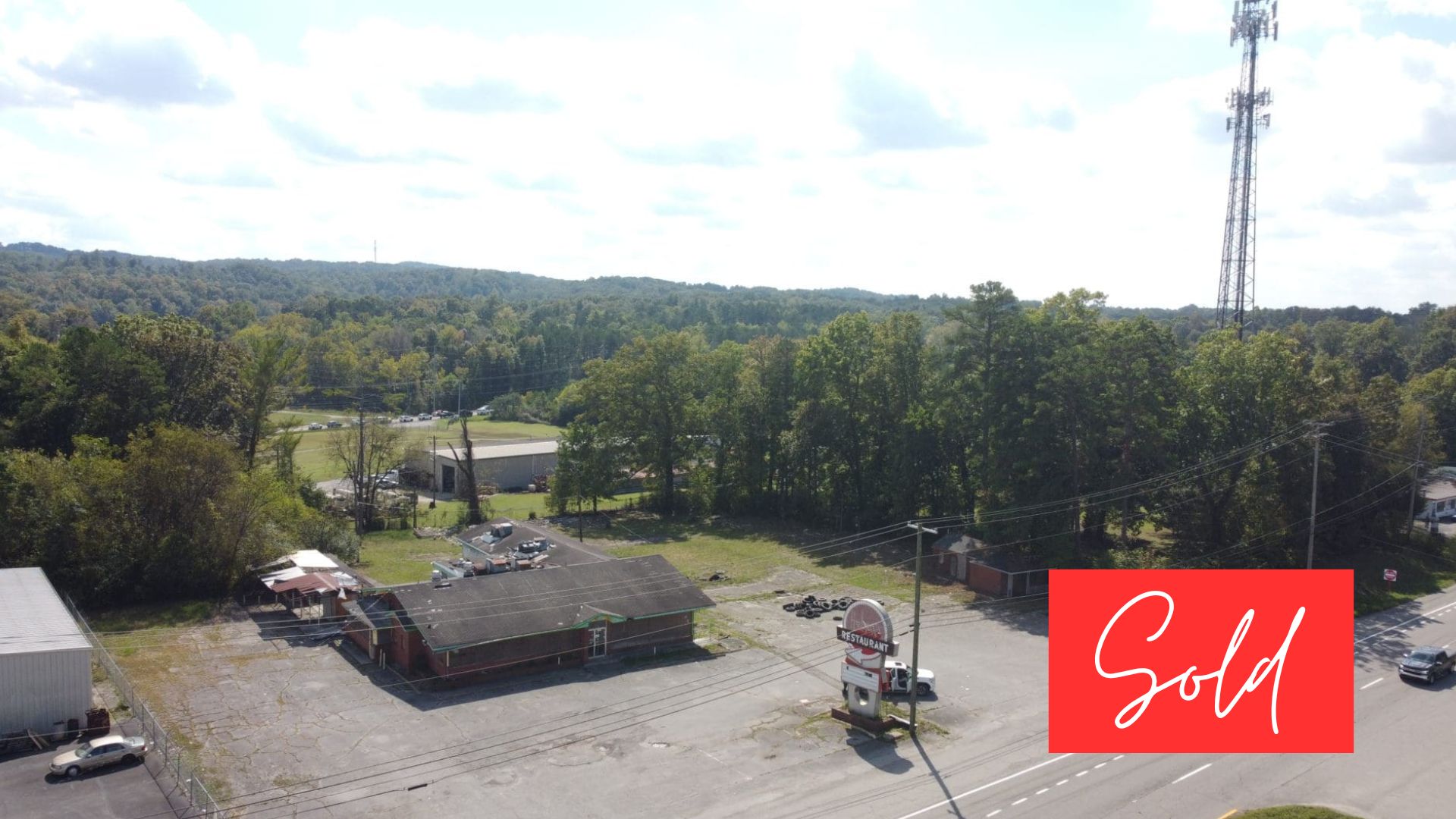 This image is by Powell Auction & Realty.