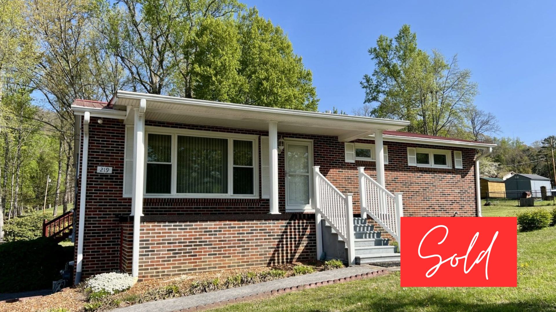 This image is by Powell Auction & Realty.
