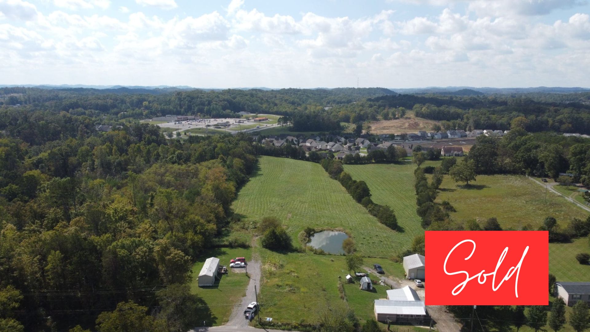 This image is by Powell Auction & Realty.