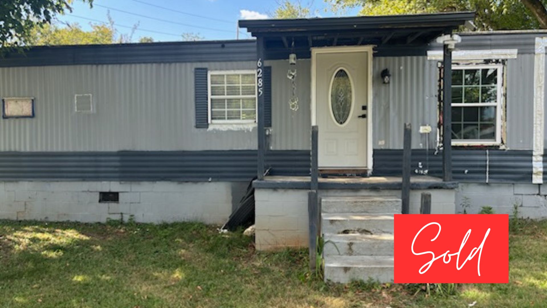 This image is by Powell Auction & Realty.