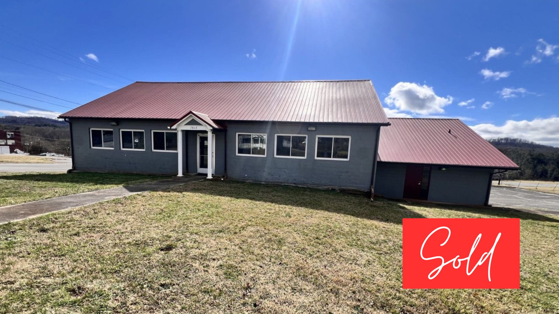 This image is by Powell Auction & Realty.