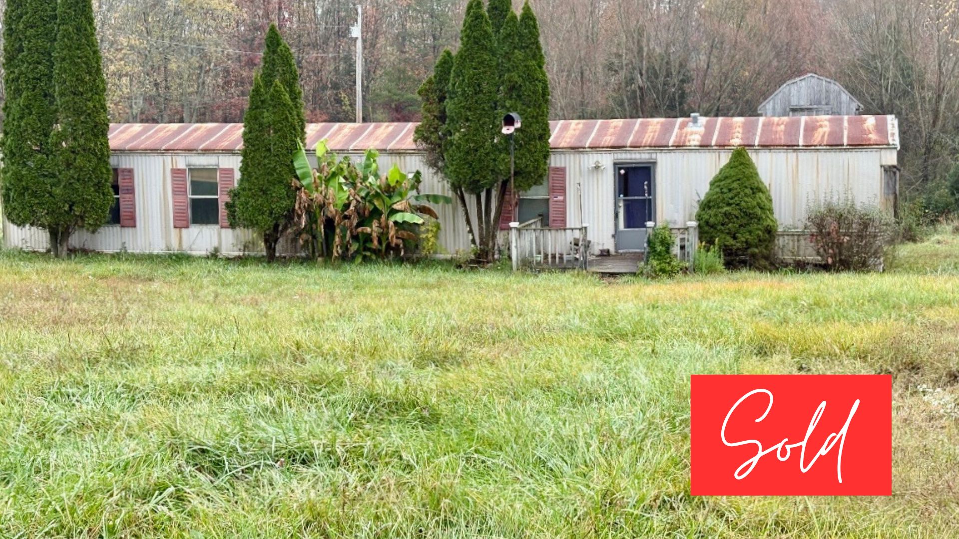 This image is by Powell Auction & Realty.
