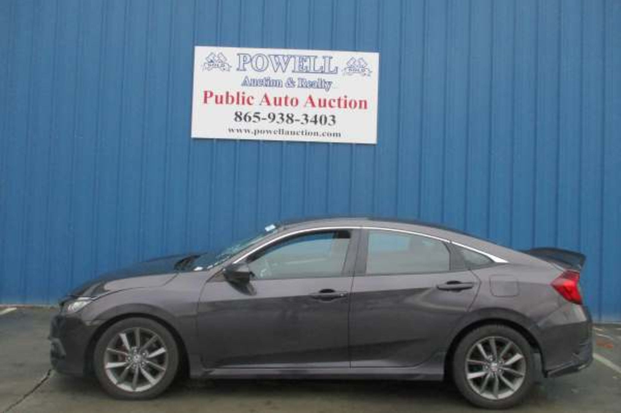 This image is by Powell Auction & Realty.